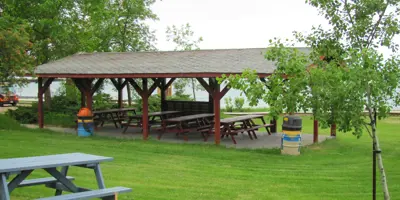 Picnic tables in the pavilion at Dunsmoor Park, Kincardine.