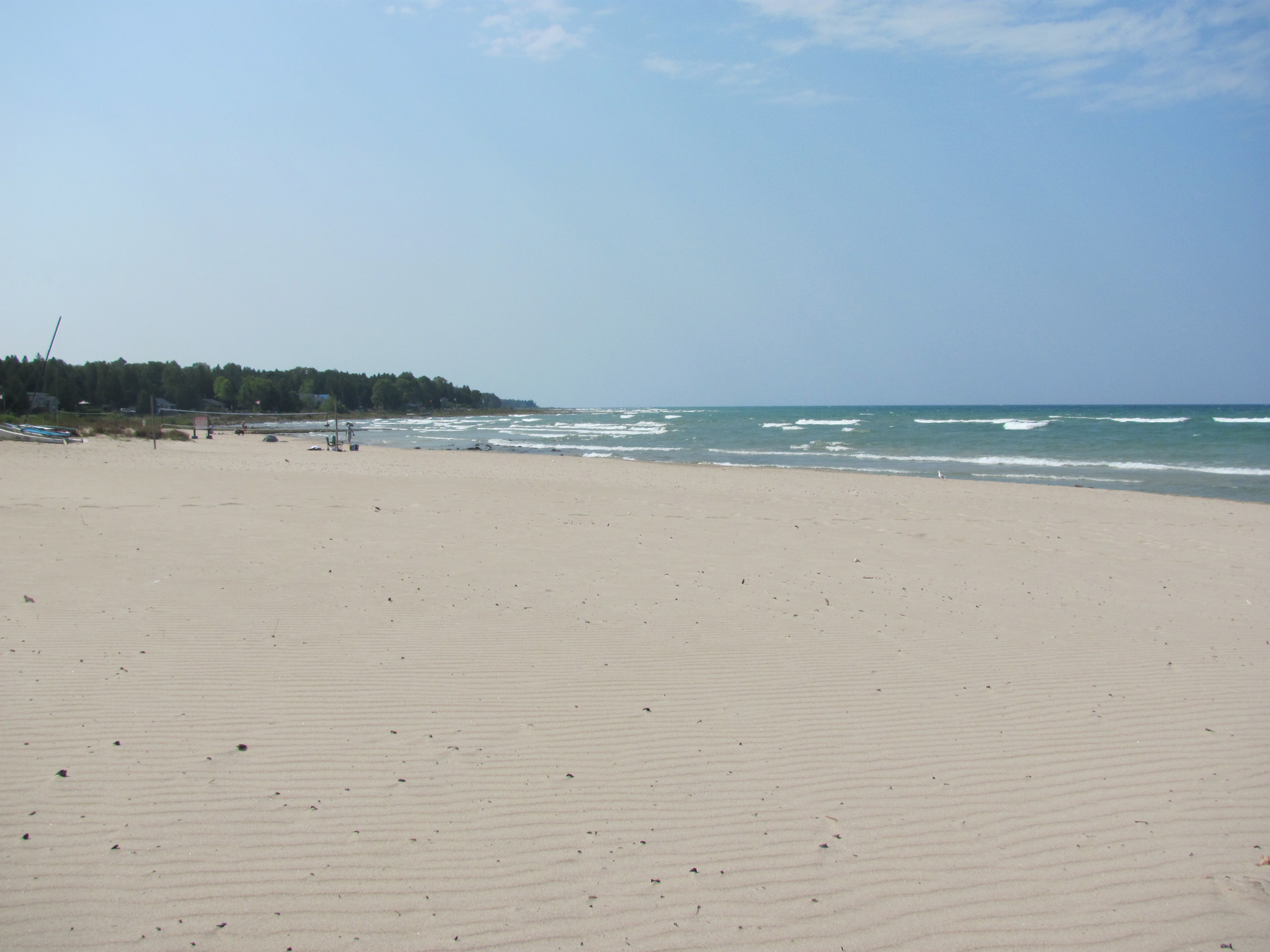 The white sands of Inverhuron Beach stretch to the waters of Lake Huron.